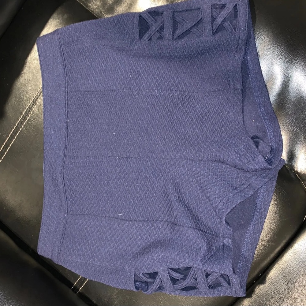 Blue shorts.